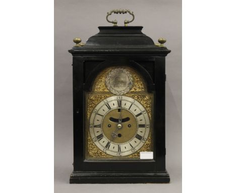 An 18th century ebonised cased striking bracket clock with 19th century movement, the silvered brass dial with Roman and Arab