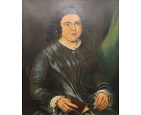 19TH CENTURY SCHOOL, A Portrait of a Girl Holding a Book, oil on canvas, framed. 62.5 x 75 cm.