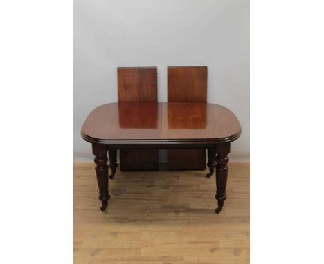 Late 19th/early 20th century mahogany extending dining table by Selbat, of rounded rectangular form, with wind out mechanism,