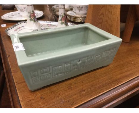 Chinese Celadon glazed plant trough, seal mark to base.Condition report: 24.5cm long x 15cm wide x 8.5cm highChip to one corn