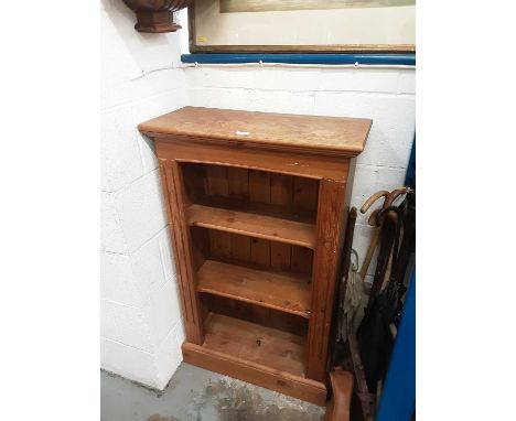 Pine book case on plinth, pillar uprights, tongue and grooved back and two adjustable shelves, 65 cm wideCondition report: 10