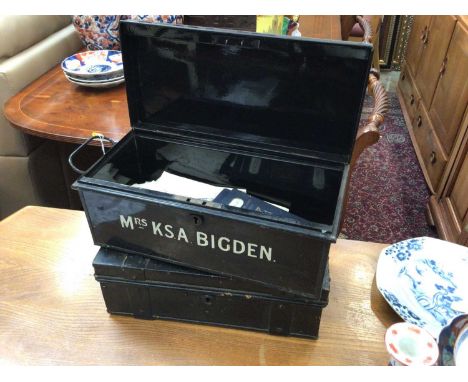 Two tin trunks containing ephemera, along with a chess set in casket and board