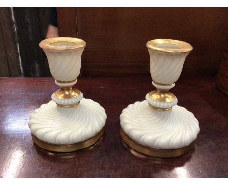 Pair of Royal Worcester gilt candlesticks, model number 1328, 10.5cm highCondition report: Good condition