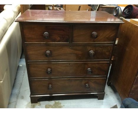 Victorian mahogany chest of two short and three long draws, with turned wood handles, raised on bracket feet, 106 x 101 x 51c