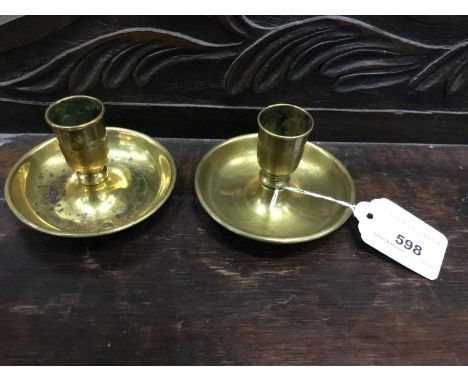 Antique brass Brighton bun candlesticks of typical form, 9cm diameter. Ex New Hall, Chelmsford