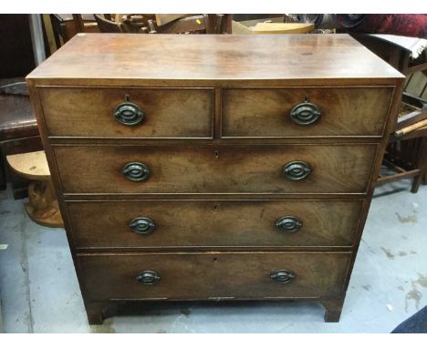 Georgian mahogany chest of two short and three long draws, with box wood stringing and brass handles, raised on bracket feet,
