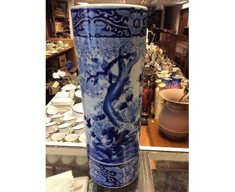 Blue and white ceramic stick stand with landscape scene decoration