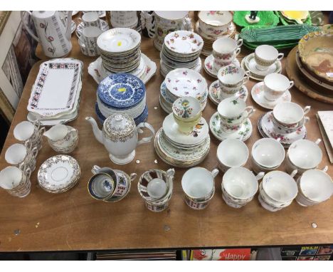 Large quantity of assorted teaware to include cups, saucers and trays