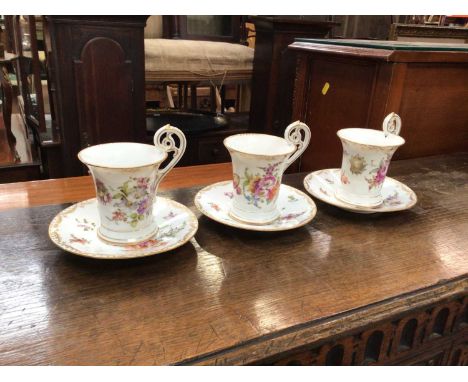 Three Dresden porcelain cups and saucersCondition report: 1 cup has a damaged foot rim, all other pieces are in good conditio