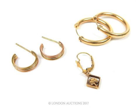 A pair of 9 ct hoop earrings with three bands of different coloured gold (rose, yellow and white) Length: 1.3 cm, a pair of 9