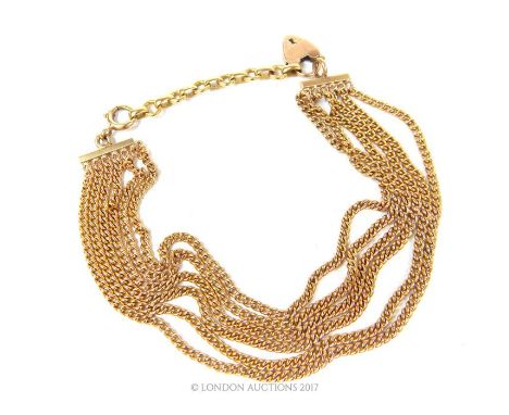 Vintage, 9 ct yellow gold bracelet composed of six rows of link chains with hallmarked padlock charm and chunky larger chain 