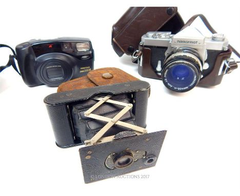 A selection of vintage cameras to include a 'V. P. Autographic Kodak Special' camera in fitted brown leather case, a 'Pentax 