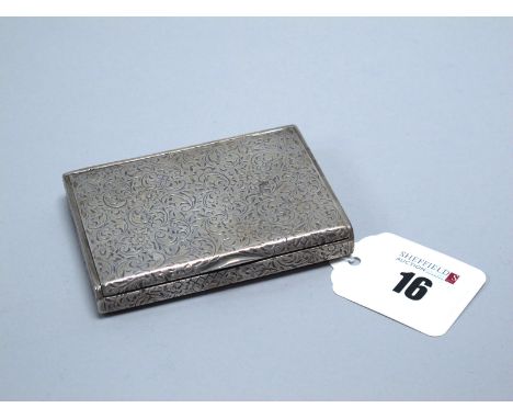 A Decorative Cigarette Case / Snuff Box, of rectangular form allover foliate scroll engraved, with hinged lid, stamped inside