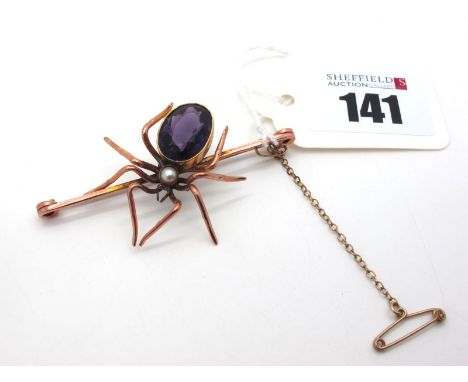 A Large Vintage Spider Bar Brooch, with oval collet set body, applied to plain bar (5.9cm long).Lot 141 - The purple 'stone' 