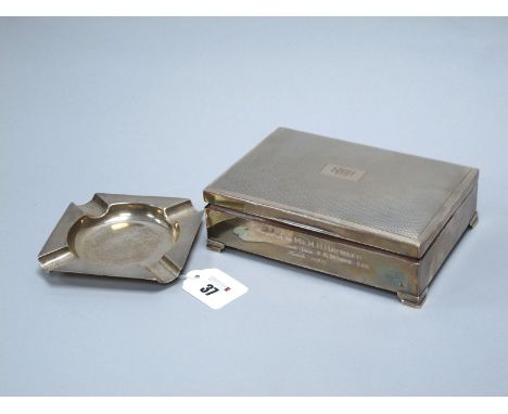 A Hallmarked Silver Cigarette Box, H.Bros, Birmingham 1966(?rubbed) the rectangular hinged lid with engine turned decoration 