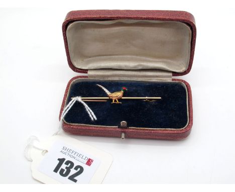 A c.Early XX Century Pheasant Bar Brooch, textured and highlighted in enamel, applied to plain bar, stamped "9ct", 5.5cm long