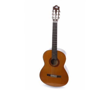 YAMAHA C40 CLASSICAL ACOUSTIC GUITARserial number OPI1xxxx3, natural wood finish, nylon strings, 19 frets, 25 1/2" scale, wit