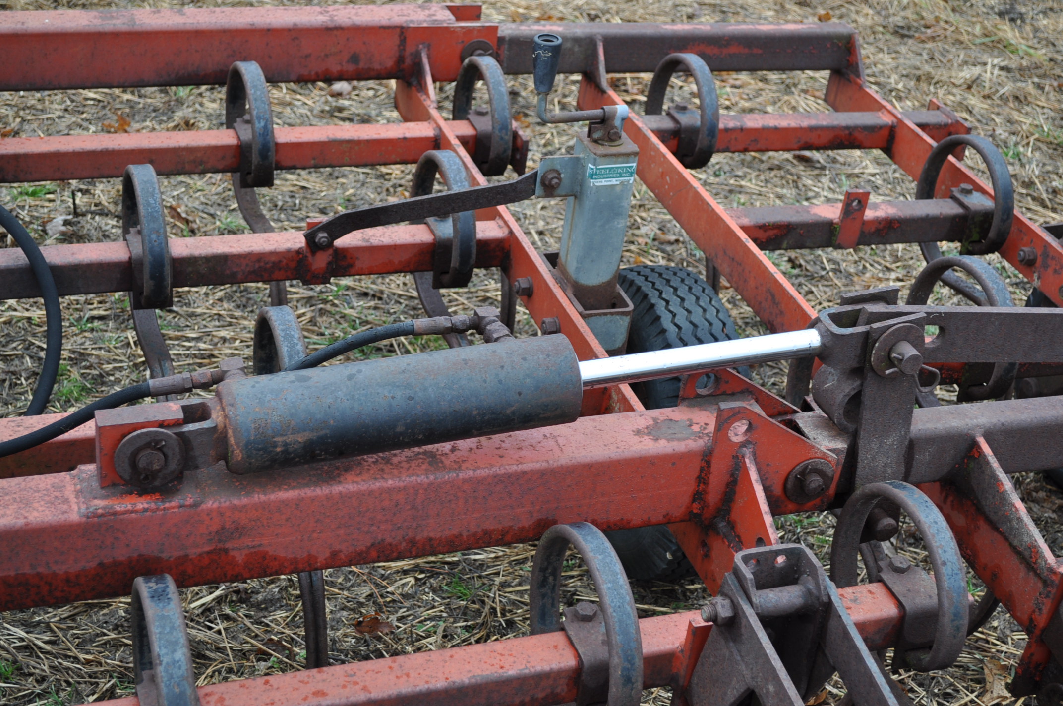 15’ McKey field cultivator, Danish tine, 3 pt, hyd fold, rear baskets