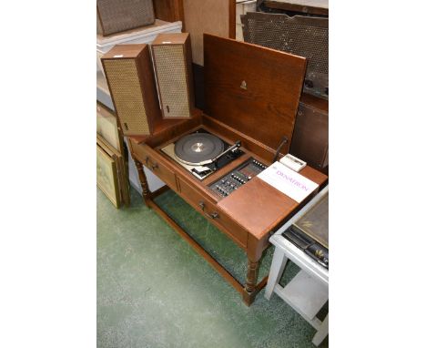A Garrad ST25 MK IV record deck with a Dynotron tuner amplifier and a pair of realistic solo 4C speakers ( 3 )