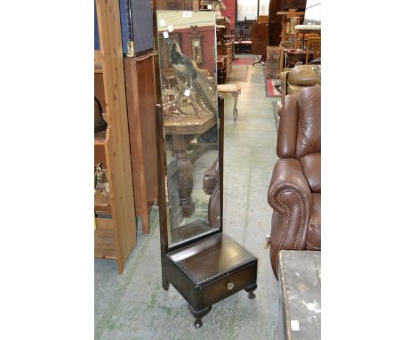 A cheval mirror with single drawer to base.
