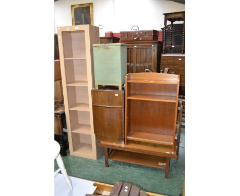A retro teak coffee table, c.1960; contemporary beech  effect tall bookcase; a 1950's walnut veneered small cupboard; a Lloyd