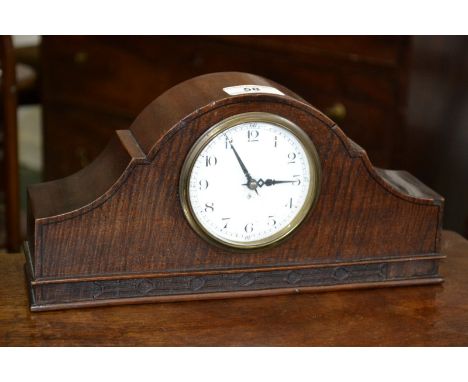 A mahogany mantel clock, French movement, enamel dial