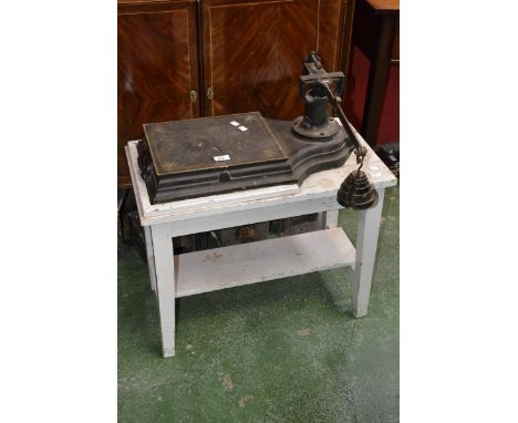 A set of early 20th century cast iron weighing scales.