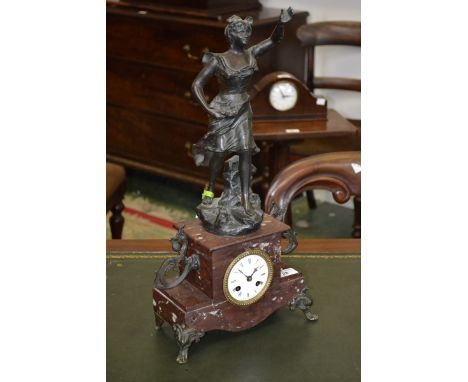 A Victorian rouge marble mantel clock, figural top of a young lady, signed