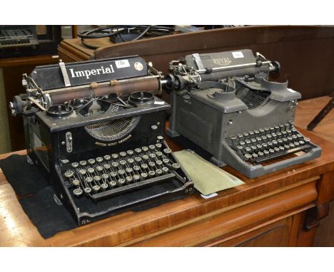 An Imperial typewriter and cleaning kit; a Royal typewriter (2)