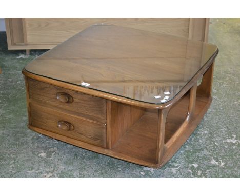 A Ercol Pandora box coffee table.
