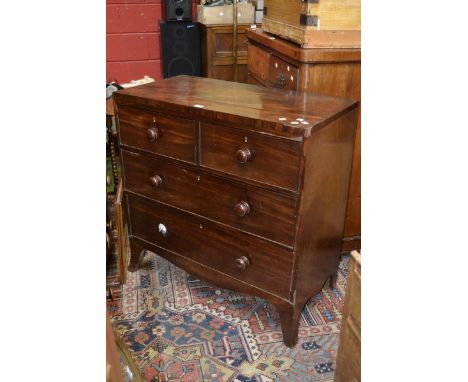 A Victorian mahogany veneered chest, caddy top, two short drawers over two graduated long, button handles, shaped skirt, spla