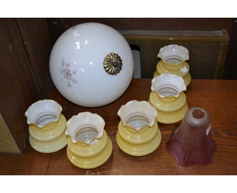 Lighting - a Cranberry glass shade ; a glass floral ball ceiling light with brass fittings ;  five lemon coloured lamp shades