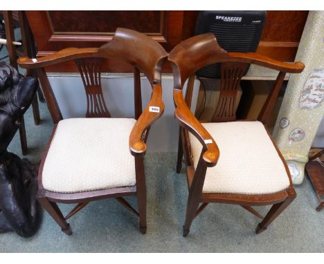 Pair of Edwardian Walnut corner chairs with Satinwood Inlay, Harp backs, supported on tapering legs with cruciform supports 
