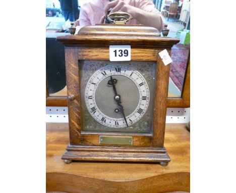 Good quality Oak cased Bracket clock with Roman numeral dial