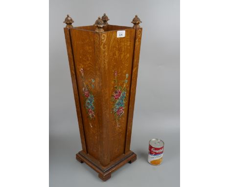 Fine hand painted stick stand adorned with pineapple finials 