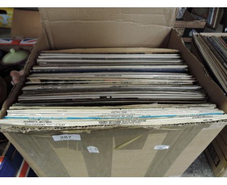 A selection of vintage records 33rpm Lp's and albums pop rock etc