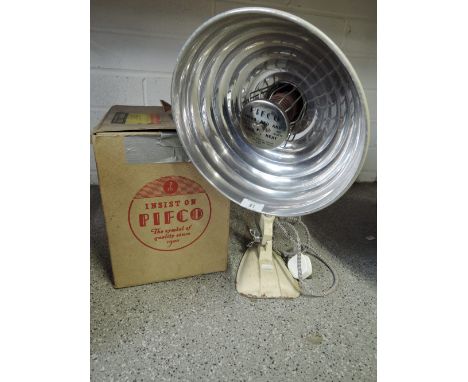 A vintage Pifco radiant heat light with box 