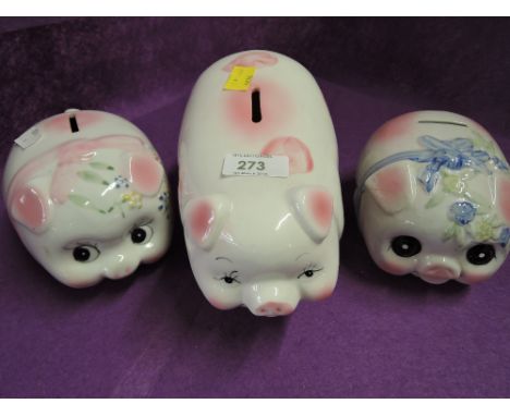 Three ceramic piggy banks