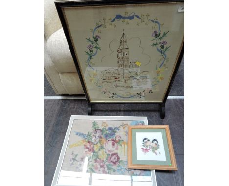 An embroidered firescreen, tapestry work etc
