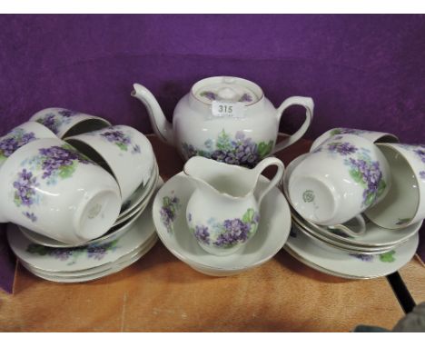 A part Victoria tea service with Violet floral design, approx 34 pieces