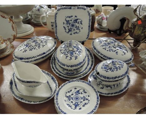 A vintage dinner service by Mintons including tureen plates etc
