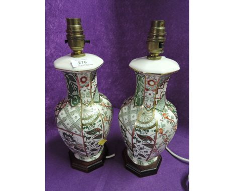A pair of Masons Applique design ceramic table lamps on treen base