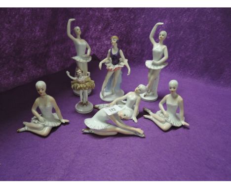 A selection of vintage ceramic ballerina figures and figurines