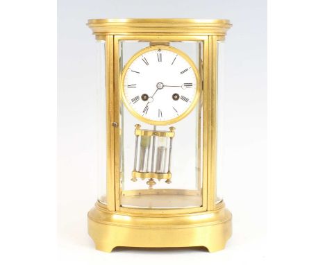 A late 19th century French gilt brass four-glass mantel clock by Gabe Vicarino &amp; Co of Paris, having a white enamel Roman