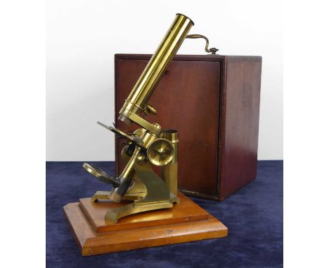 A mid-Victorian lacquered brass monocular microscope by J H Steward of 406 Strand, London, sold with various lenses and objec