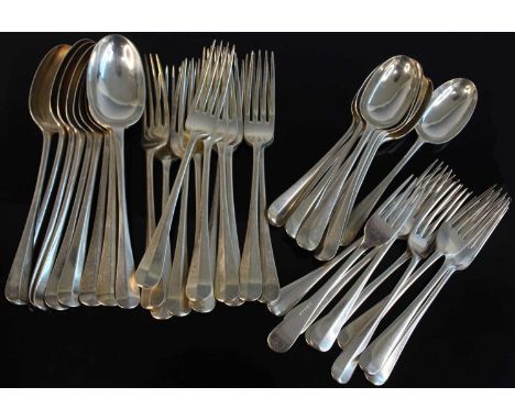 A harlequin suite of mainly early 20th century silver cutlery in the Hanoverian pattern, comprising nine tablespoons, eleven 