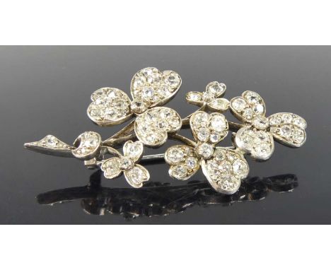 A white metal diamond shamrock style spray brooch, featuring 78 Old European and rose cut diamonds in grain settings, with ro