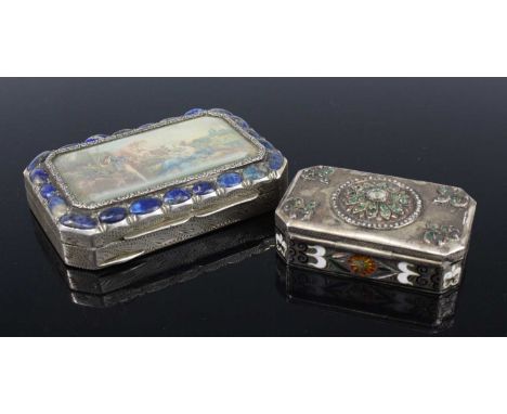 A continental white metal and paste set snuff box, of canted rectangular form, the hinged cover opening to reveal a gilt-wash