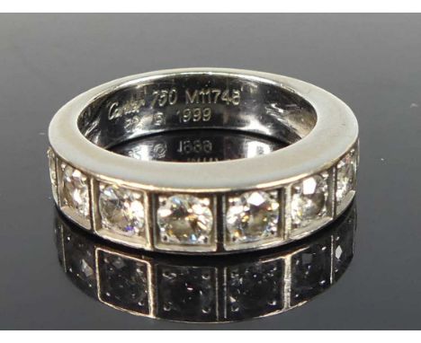A white metal diamond half eternity ring, featuring nine round brilliant cut diamonds in square settings, diamond dimensions 
