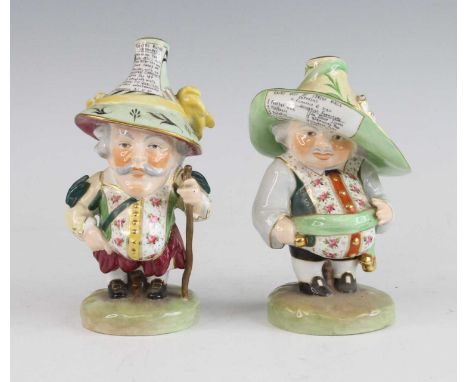 Two Royal Crown Derby Mansion House dwarves, each shown in 18th century dress, their hats with advertisments, red enamel mark